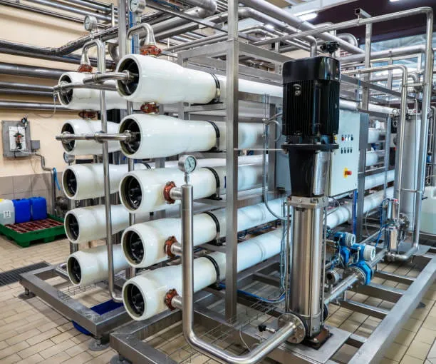 Industrial reverse osmosis membrane housings and piping at a water treatment facility